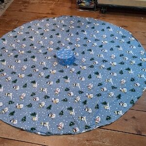 Winter tablecloth- 65" round and winter snowman tin for cookies or goodies